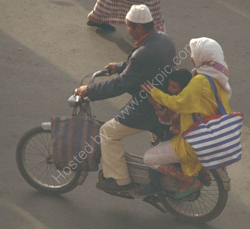 Moroccans on Motor Cycle, Place Jemaa el-Fna, Marrakech